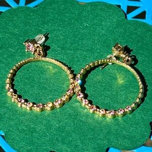 Post earrings with large loops and multi-colored stones.